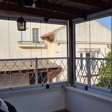 עבודה של אלון, סגירת מרפסת זכוכית (16)