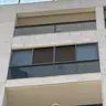 תמונה שצירף לקוח לביקורת על ישראל, סגירת מרפסת זכוכית (2)